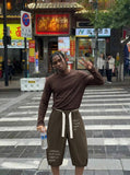 DAXUEN Baggy wide-leg pants with script prints — model photo
