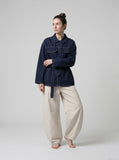 DAXUEN Men's baggy wide-leg trousers in solid black and beige — model photo