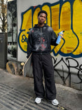 DAXUEN Loose-fitting wide-leg trousers in light grey and black — model photo