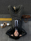 DAXUEN Baggy wide-leg trousers with curved seams — model photo