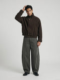 DAXUEN Baggy wide-leg trousers with curved seams — model photo