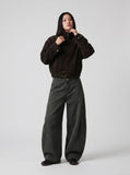 DAXUEN Baggy wide-leg trousers with curved seams — model photo