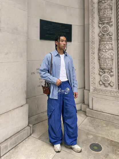 DAXUEN Oversized wide-leg cargo pants with graphic design — model photo