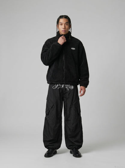DAXUEN Oversized wide-leg cargo pants with graphic design — model photo