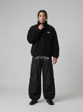 DAXUEN Oversized wide-leg cargo pants with graphic design — model photo