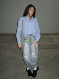 DAXUEN Wide-leg baggy jeans with alien graphic — model photo