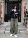 DAXUEN Wide-leg balloon-leg cargo pants in olive green and charcoal grey — model photo