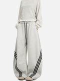 DAXUEN black balloon leg striped casual pants