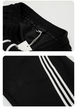 DAXUEN black balloon leg striped casual pants