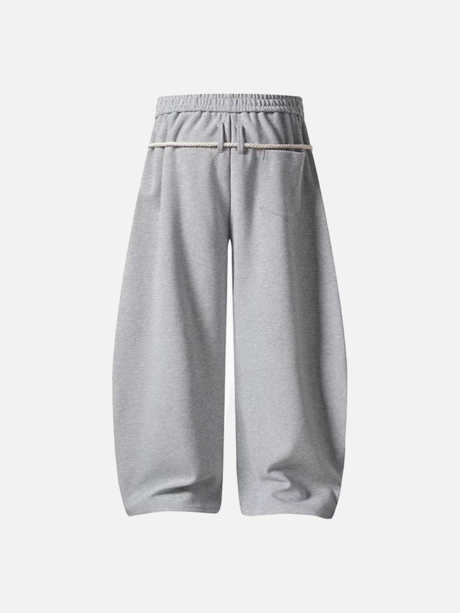 Loose-fitting balloon pants with plaid details