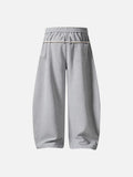 Loose-fitting balloon pants with plaid details