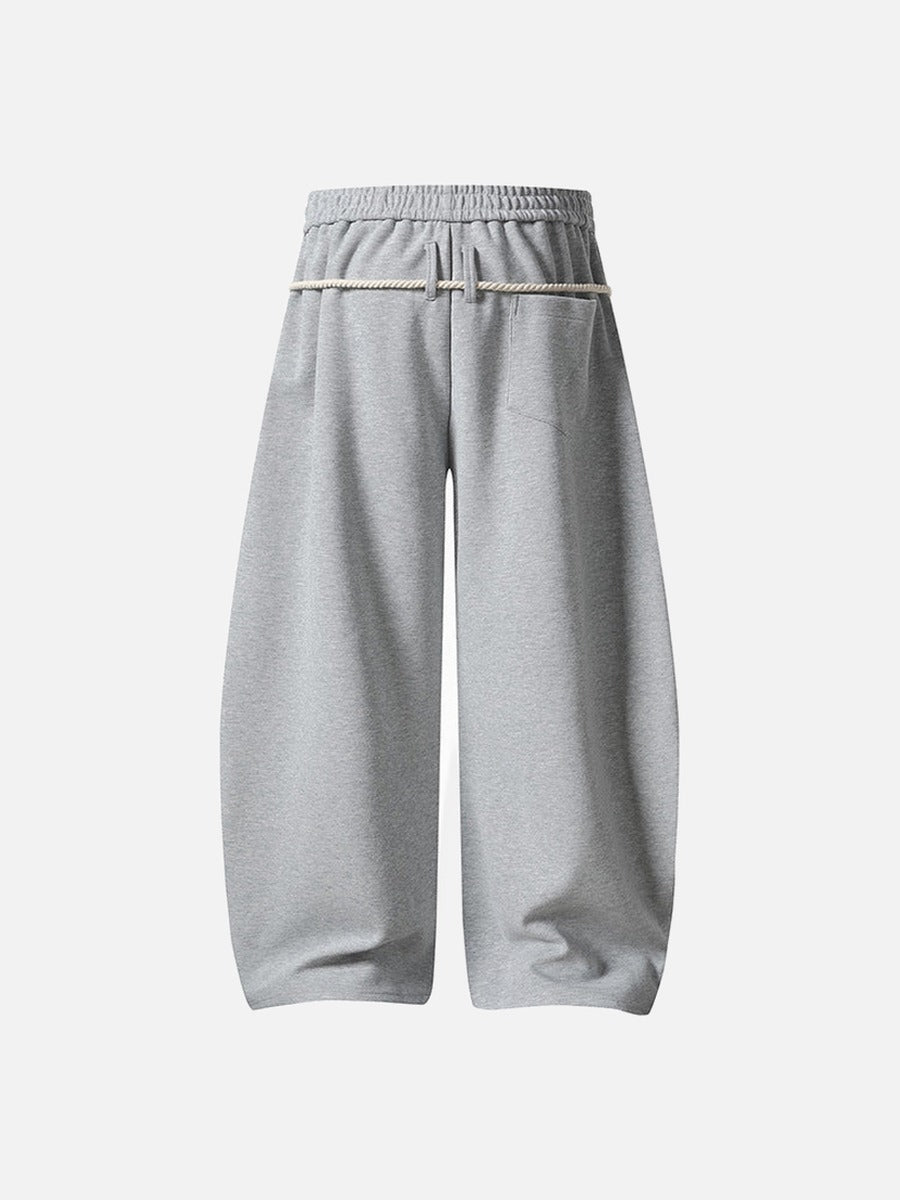 Loose-fitting balloon pants with plaid details
