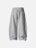 Loose-fitting balloon pants with plaid details
