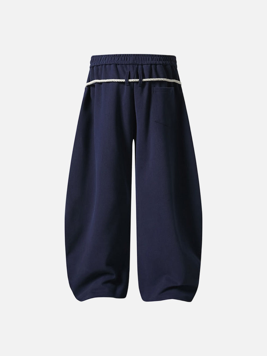 Loose-fitting balloon pants with plaid details