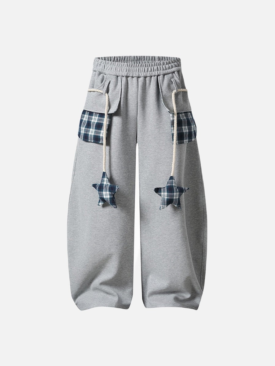 Loose-fitting balloon pants with plaid details