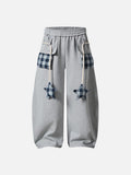 Loose-fitting balloon pants with plaid details
