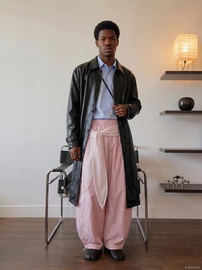 DAXUEN Wide-leg balloon pants with sash and embroidery — model photo