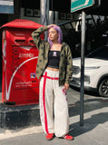 DAXUEN Loose-fitting wide-leg track pants with red graphics — model photo