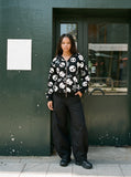 DAXUEN Wide-leg balloon trousers in tan and black — model photo