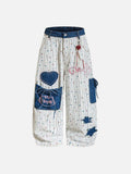 DAXUEN Wide-leg embroidered trousers with patterned fabric