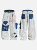 DAXUEN Wide-leg embroidered trousers with patterned fabric