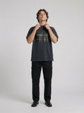 DAXUEN Distressed graphic t-shirt with raw edges — model photo