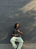 DAXUEN Distressed graphic t-shirt with raw edges — model photo