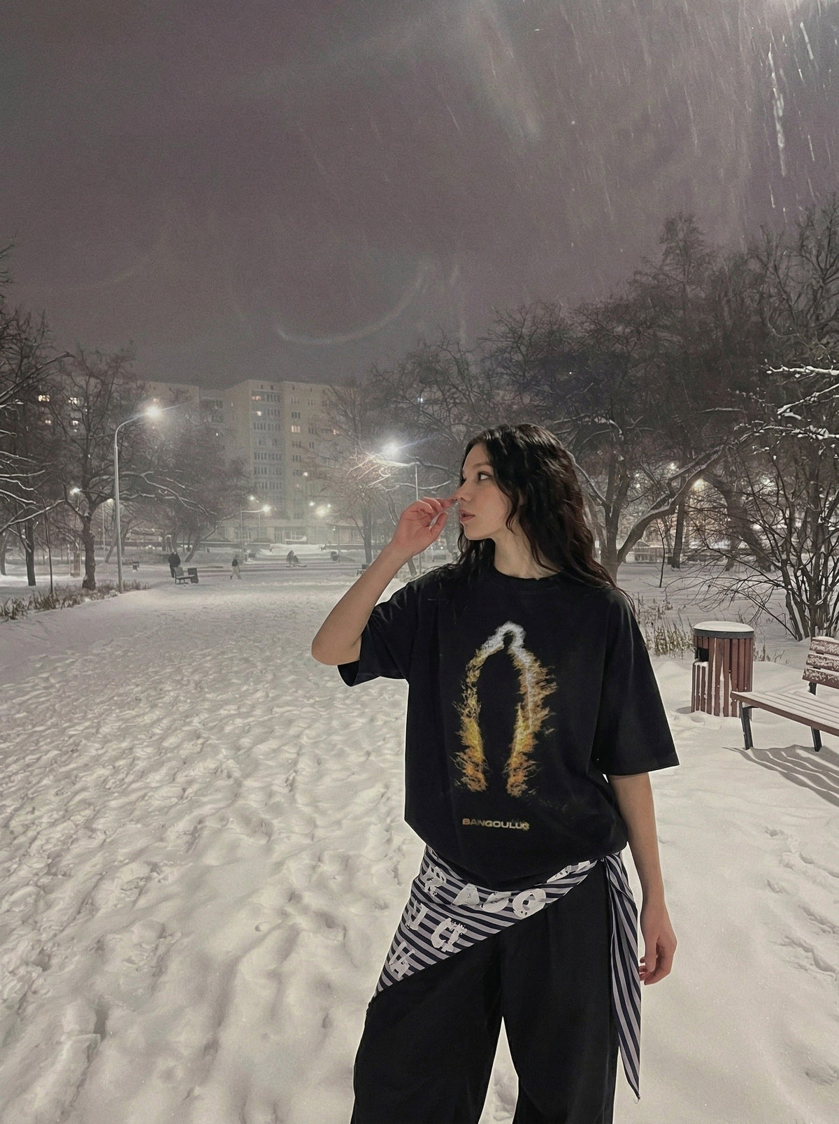DAXUEN Distressed graphic T-shirt with human silhouette — model photo