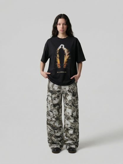 DAXUEN Distressed graphic T-shirt with human silhouette — model photo