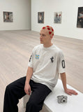 DAXUEN BANGOULUO oversized graphic T-shirt — model photo