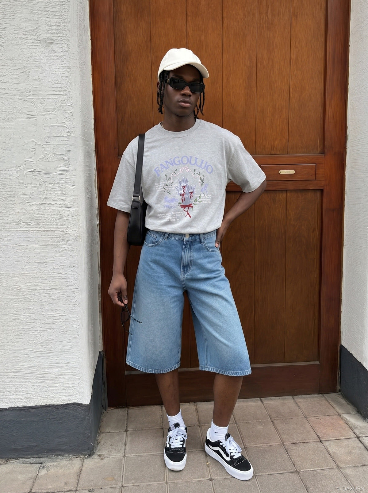 DAXUEN BANGOULUOU Graphic T-Shirt with floral and cartoon prints — model photo