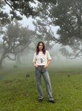 DAXUEN BANGOULUOU Graphic T-Shirt with floral and cartoon prints — model photo