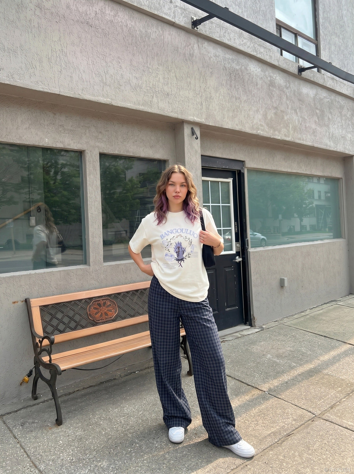 DAXUEN BANGOULUOU Graphic T-Shirt with floral and cartoon prints — model photo