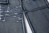 DAXUEN faded blue cargo jeans with barbed wire embroidery