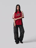 DAXUEN faded blue cargo jeans with barbed wire embroidery — model photo