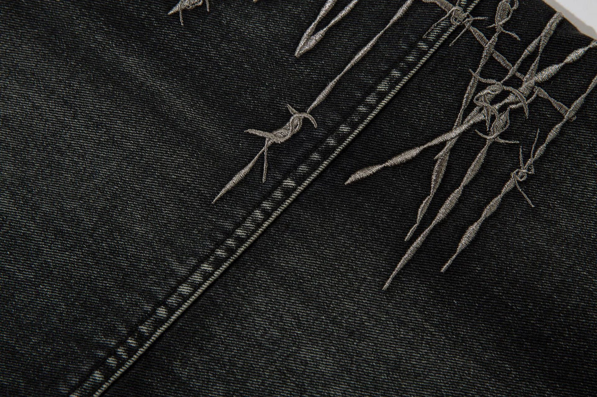 DAXUEN faded blue cargo jeans with barbed wire embroidery