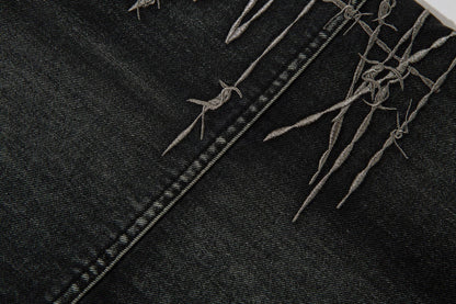 DAXUEN faded blue cargo jeans with barbed wire embroidery