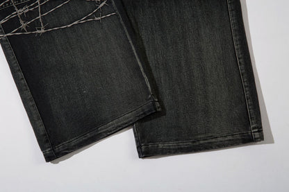 DAXUEN faded blue cargo jeans with barbed wire embroidery