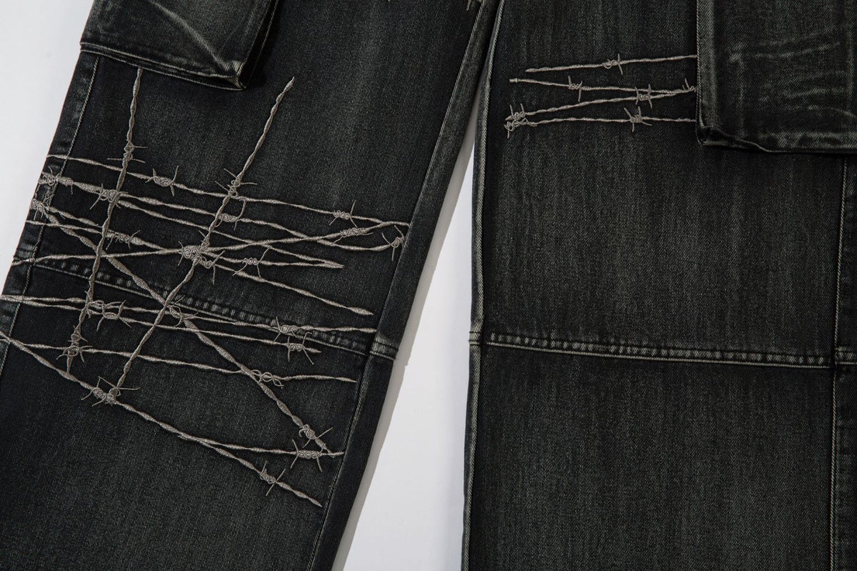 DAXUEN faded blue cargo jeans with barbed wire embroidery