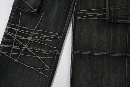 DAXUEN faded blue cargo jeans with barbed wire embroidery