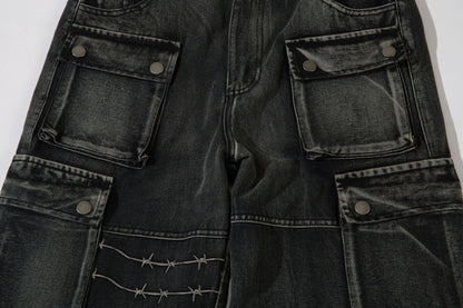 DAXUEN faded blue cargo jeans with barbed wire embroidery
