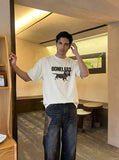 DAXUEN Relaxed Dachshund Graphic Tee — model photo