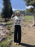 DAXUEN Be BOLD 23 Graphic T-Shirt | DAXUEN — model photo