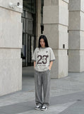 DAXUEN Be BOLD 23 Graphic T-Shirt | DAXUEN — model photo