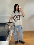 DAXUEN Be BOLD 23 Graphic T-Shirt | DAXUEN — model photo