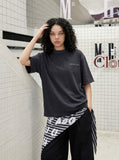 DAXUEN Distressed short-sleeve T-shirt with graphic panel — model photo