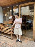 DAXUEN beige wide-leg cargo shorts with pockets — model photo