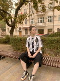 DAXUEN beige wide-leg cargo shorts with pockets — model photo