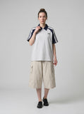 DAXUEN beige wide-leg cargo shorts with pockets — model photo