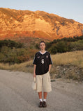 DAXUEN beige wide-leg cargo shorts with pockets — model photo